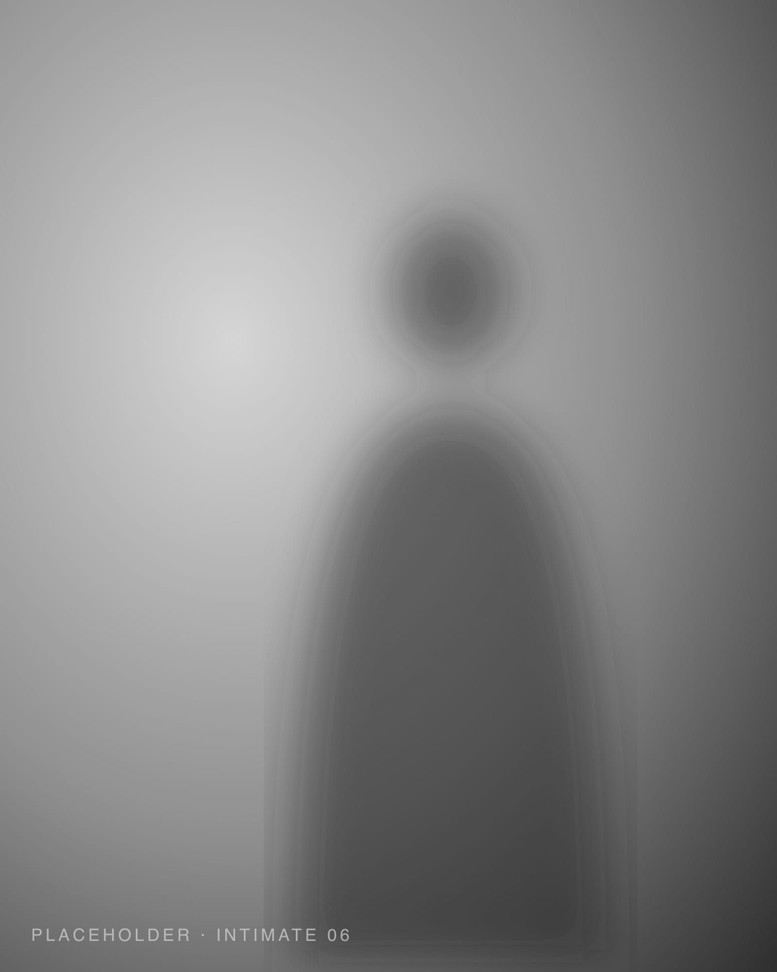 Black and white portrait looking back over the shoulder